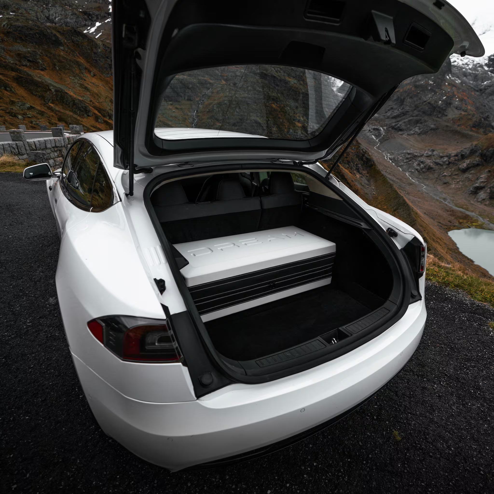 Side angle of Dreamcase Classic mattress platform inside Tesla Model S in Switzerland 