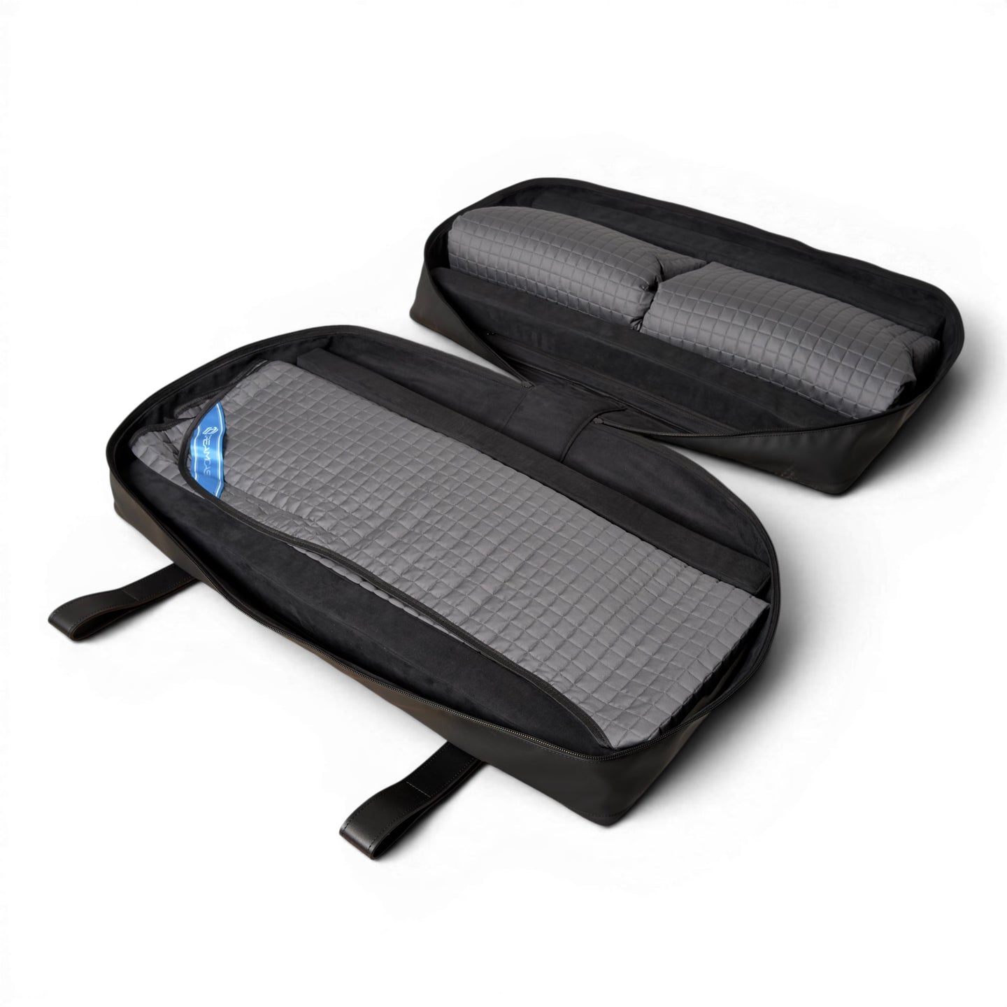 reamCase Memory open travel case showing internal storage and bedding for Tesla Model Y