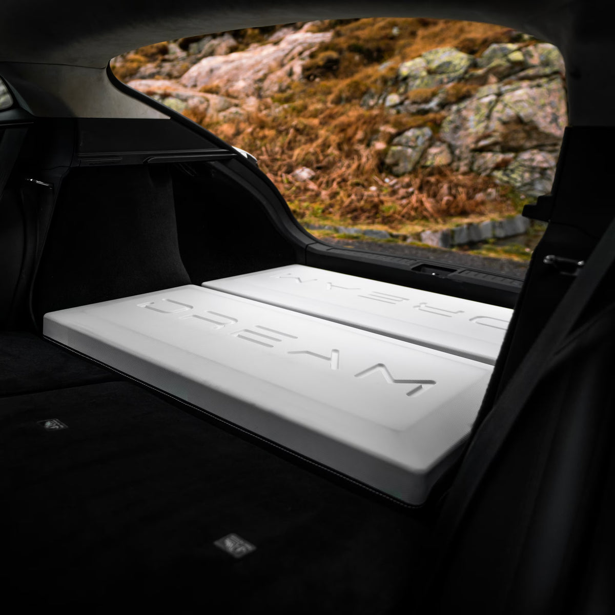 Dreamcase Classic car bed platform unfolded inside Tesla Model S trunk