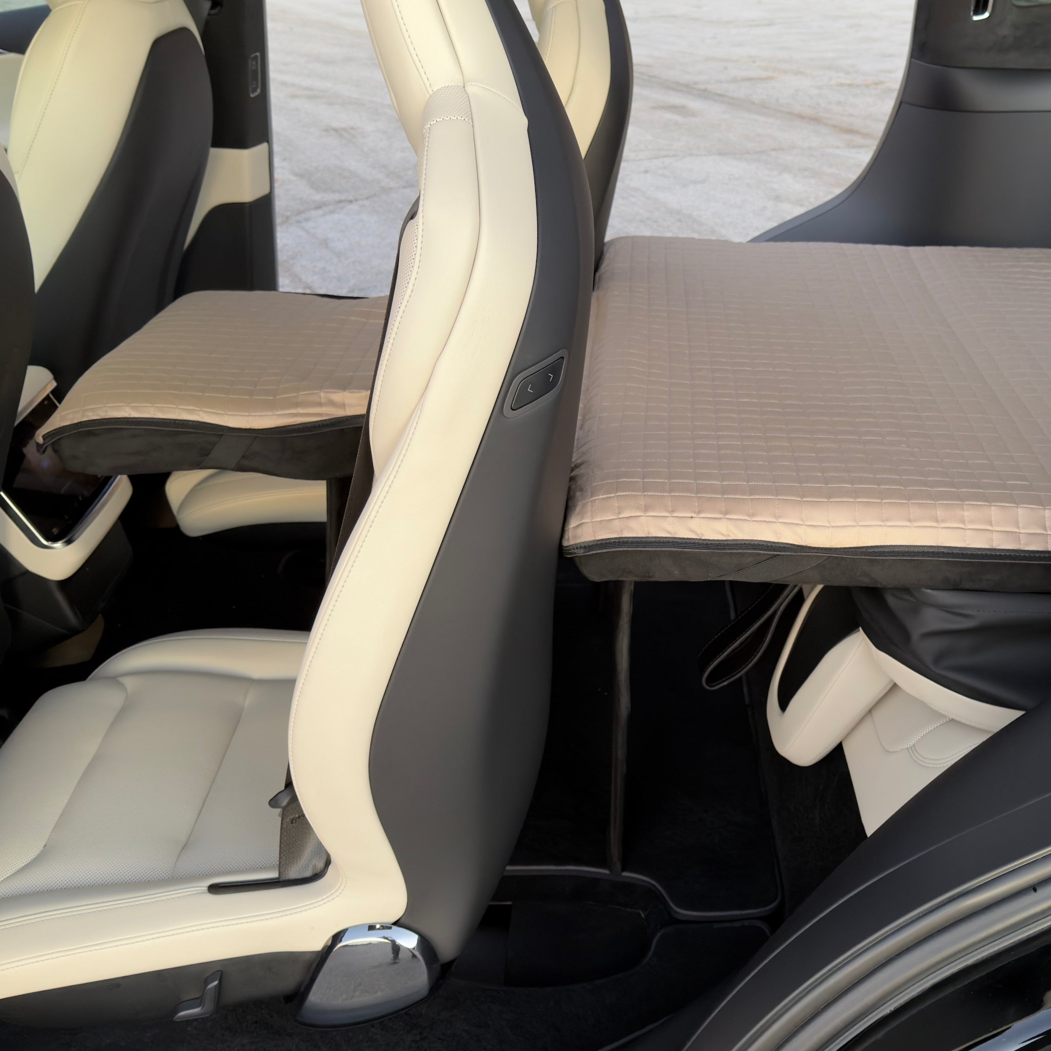 Dreamcase car bed mattress unfolded inside Tesla Model X 6-seater interior side view