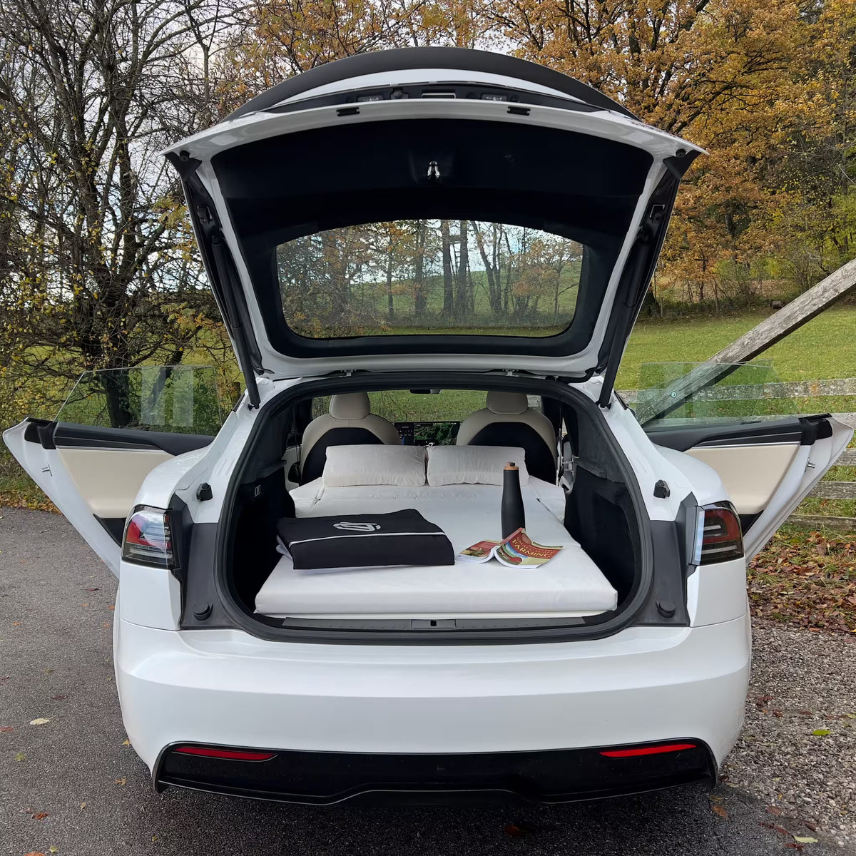 DreamCase white car mattress fully unfolded in Tesla Model S trunk