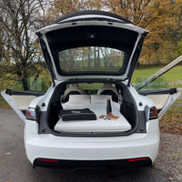 DreamCase white car mattress fully unfolded in Tesla Model S trunk