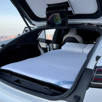 DreamCase Comfort car mattress setup inside Tesla Model S Plaid with theater display