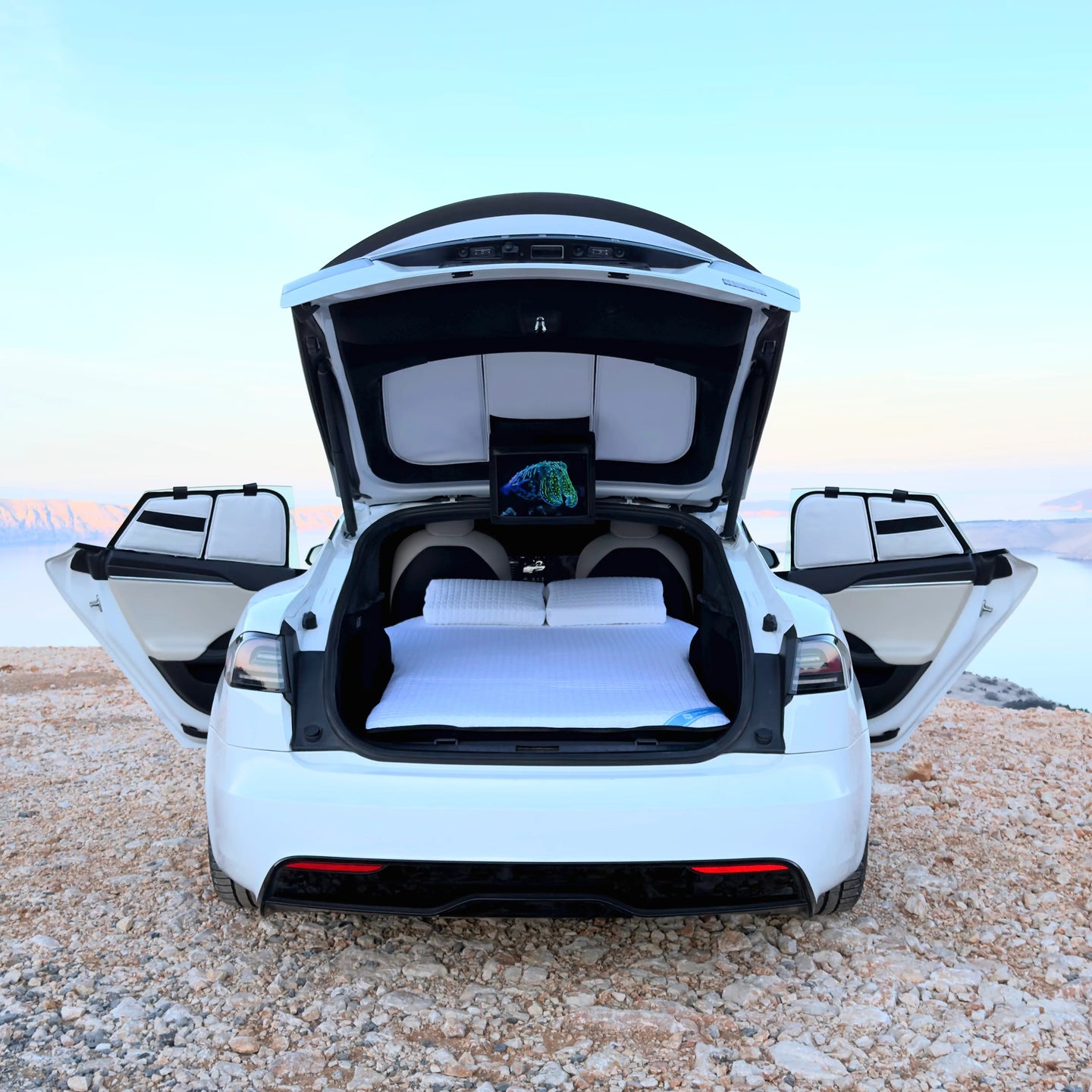 DreamCase Comfort foam car bed mattress deployed in white Tesla Model S Plaid trunk